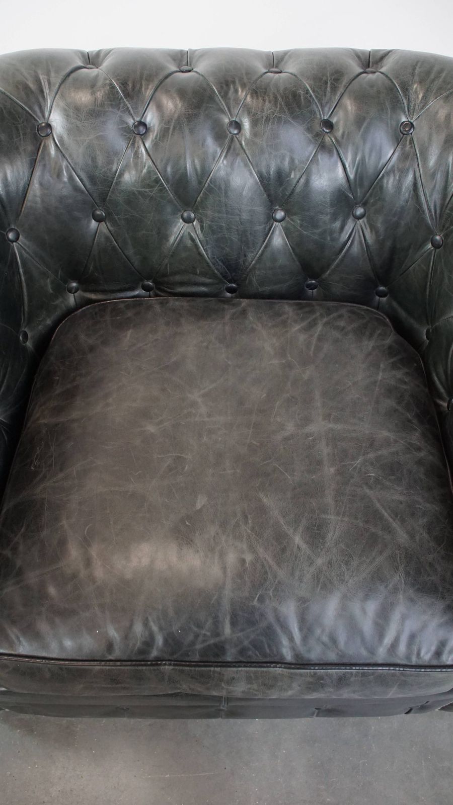 Timeless And Classic Spacious Black Chesterfield Armchair Made Of Characterful Grained Cowhide photo vinterior
