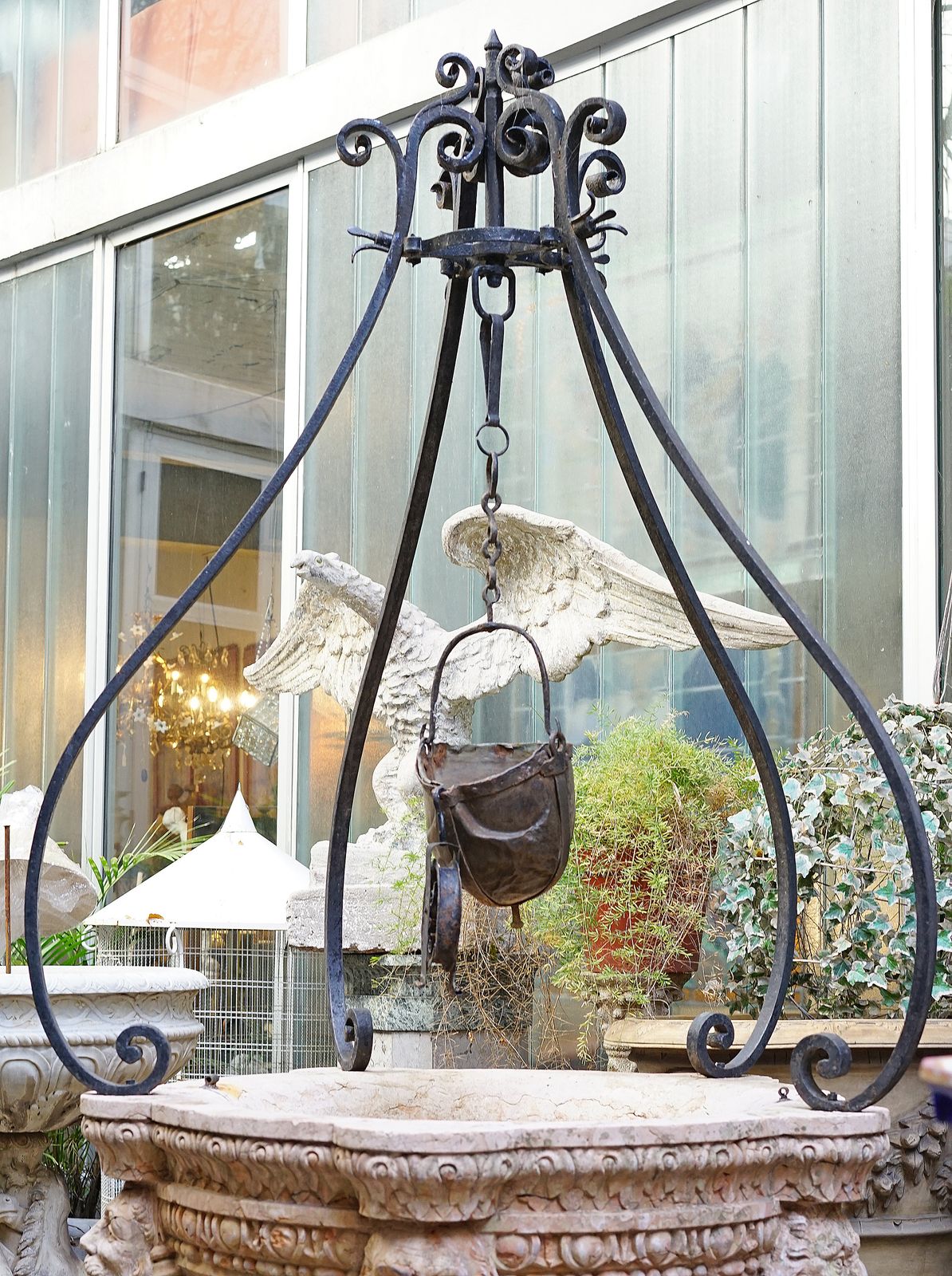 photo furniture XVII Century Renaissance Venetian Rosso Verona Marble Wellhead/Cistern With Wrought Iron Top Pulley Over Octagonal Base, Italy