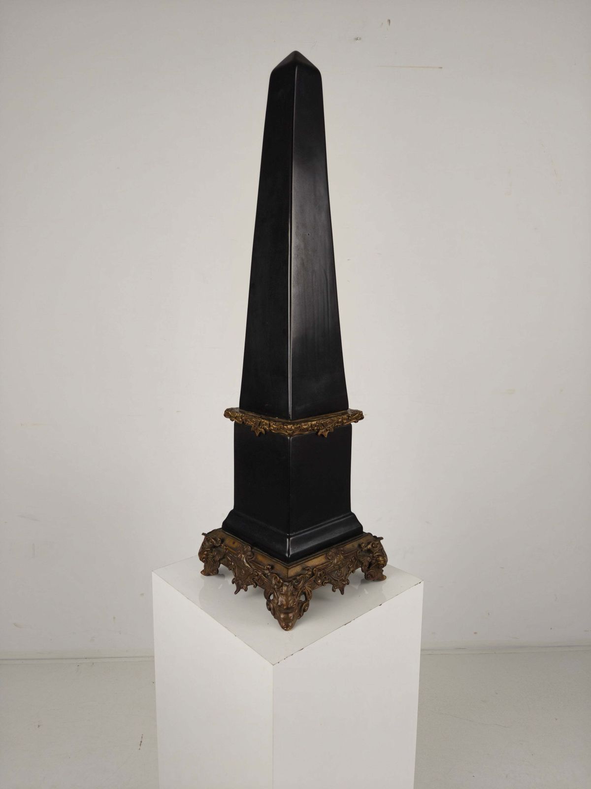 Black Porcelain Obelisk With Bronze Ornaments photo furniture