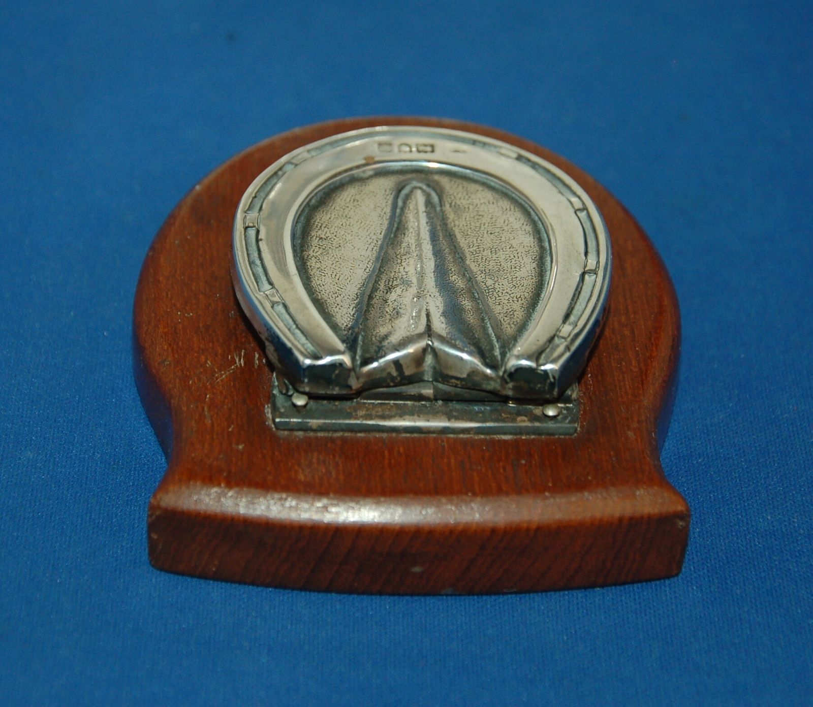 An Antique Silver And Oak Horse Hoof And Shoe Desktop Letter Clip photo furniture