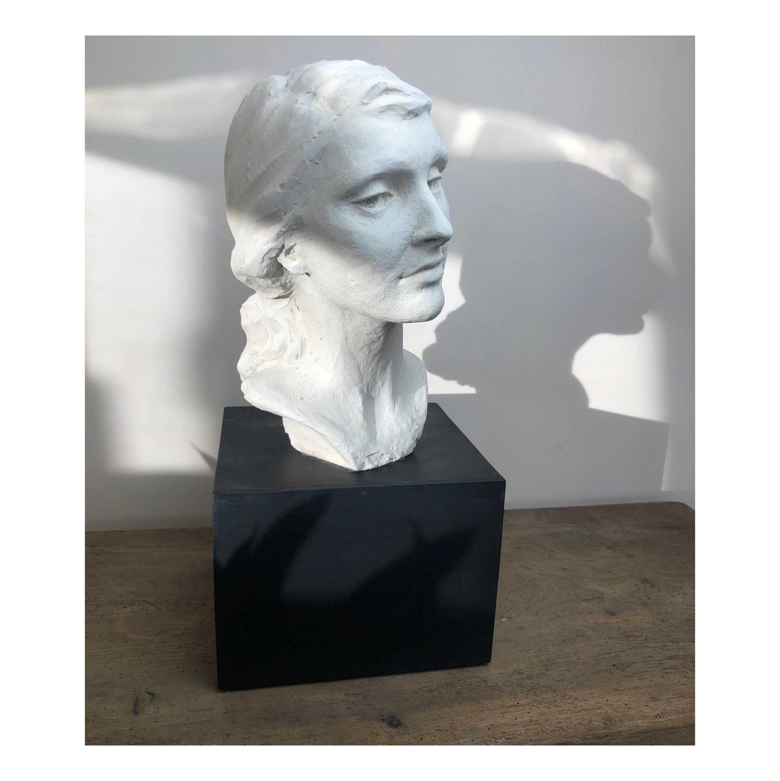 Vintage Life Size Female Head Sculpture On Black Wood Plinth White Plaster Bust Womans' Head Sculpture Art Studio Plaster Female Head Study photo for sale