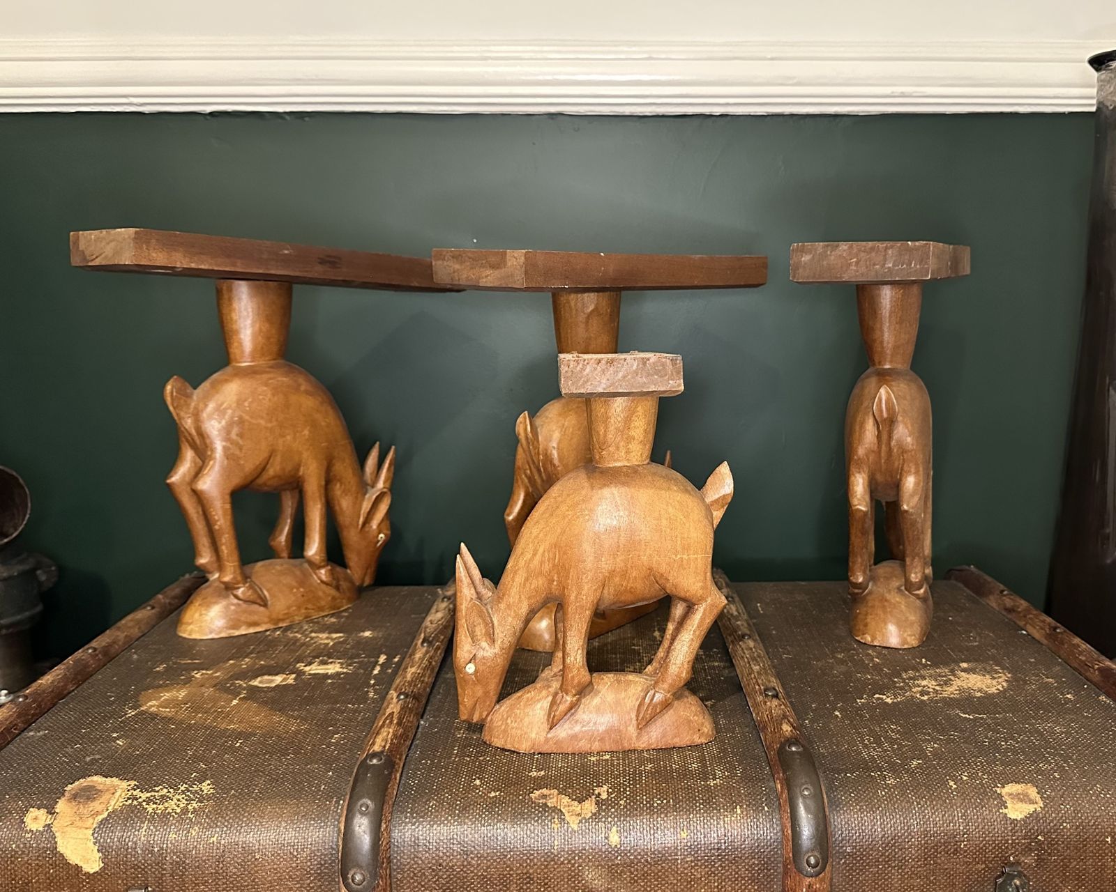An Odd Collection Of Hand Carved Antelope Sculptures photo Furniture