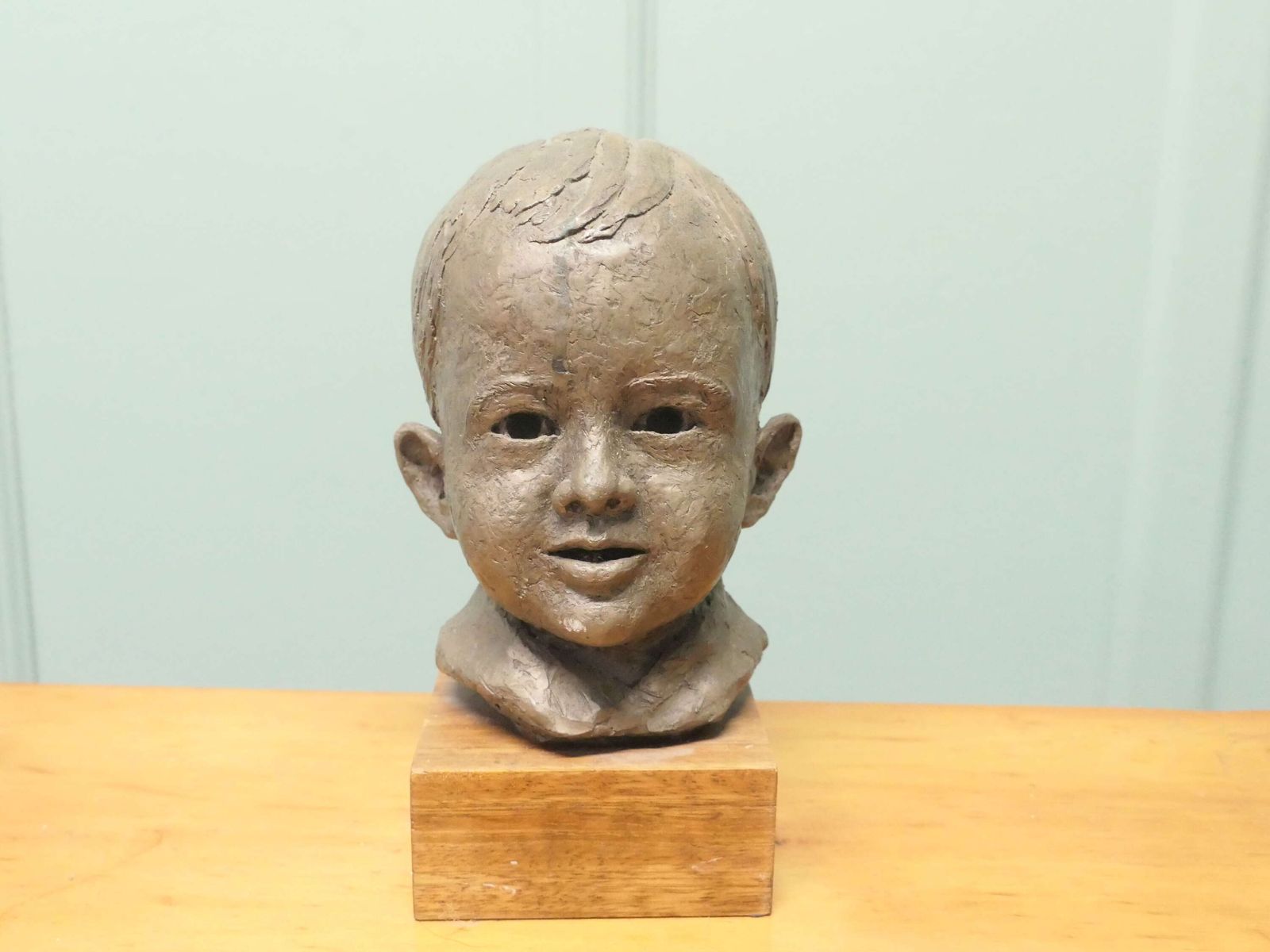 Artist’s Model Bust Of A Very Young Smiling Boy photo furniture