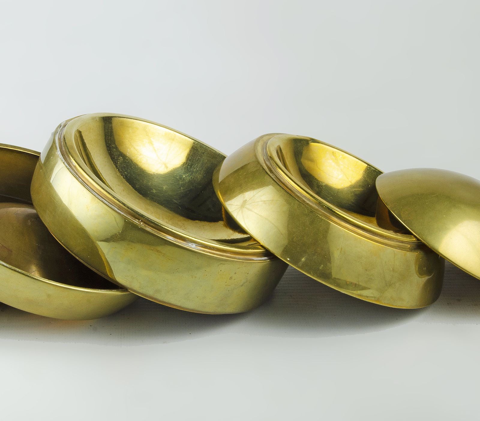 1970s Polished Brass 5 Piece Sphere/Orb Of Stacked Bowls/Ashtrays By Tommaso Barbi, Italy photo for sale