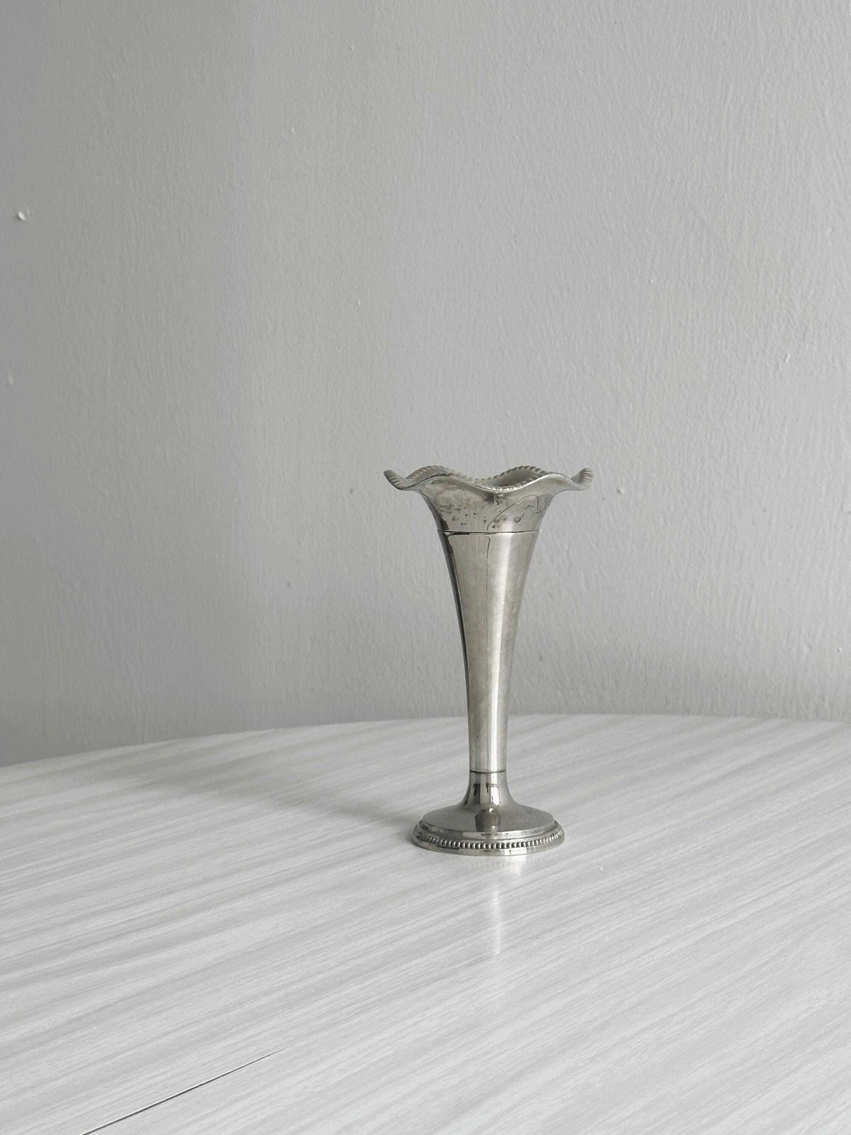 photo furniture Single Flower Vase In Shiny Silver Metal, Chic Antique Patina, Unique Object For Refined Decoration
