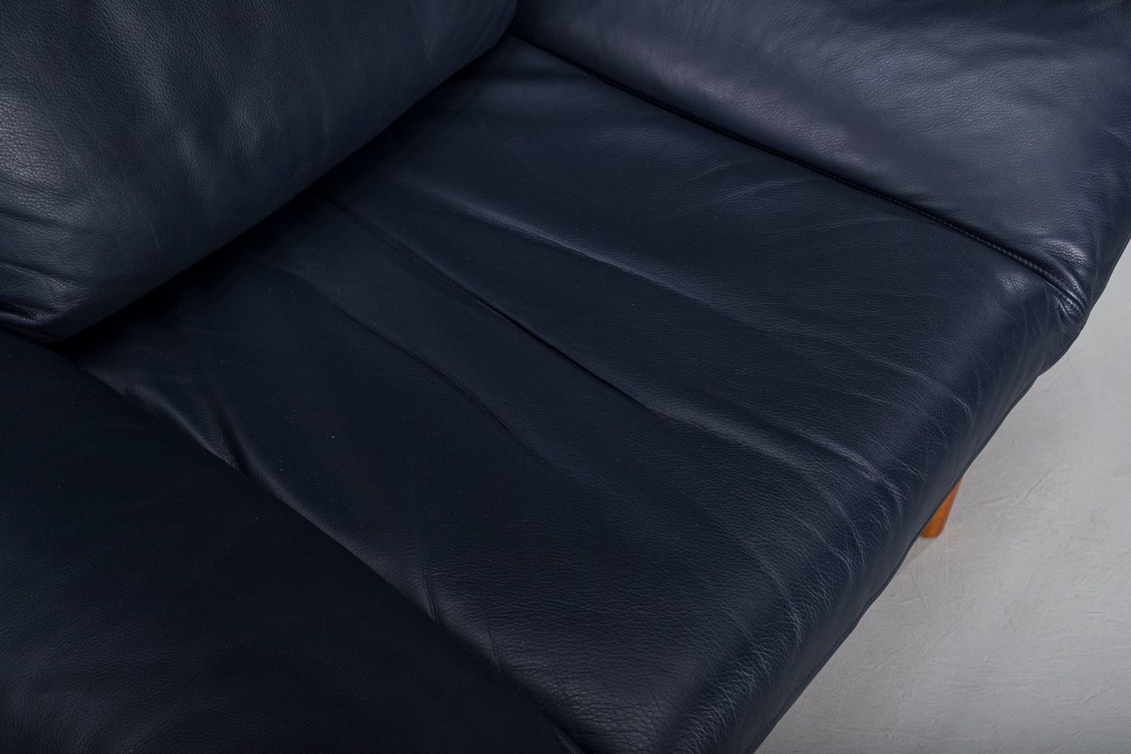 1533.0 Danish Teak And Navy Blue Leather Lounge Chair From Komfort, 1970s photo