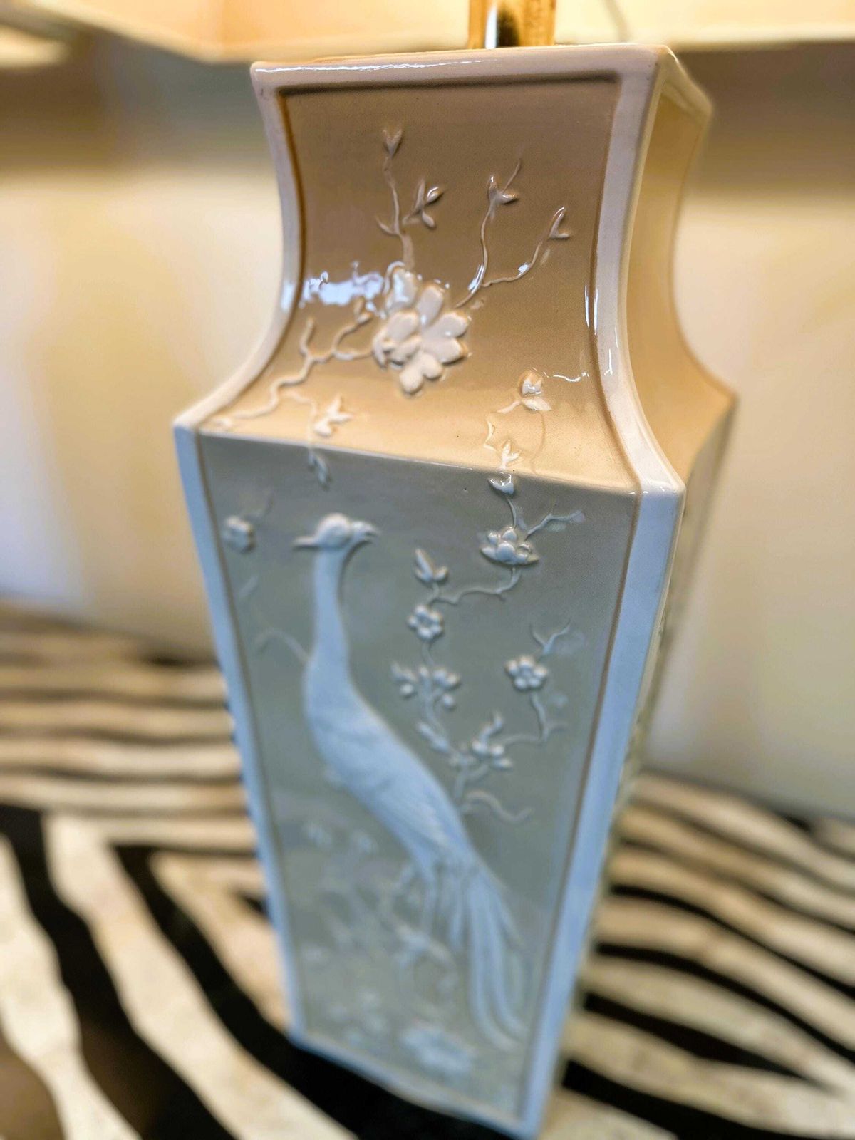 photo for sale Pair Of Large Cream Ceramic Table Lamps With Relief Peacocks And Fabric Shades, 1980s
