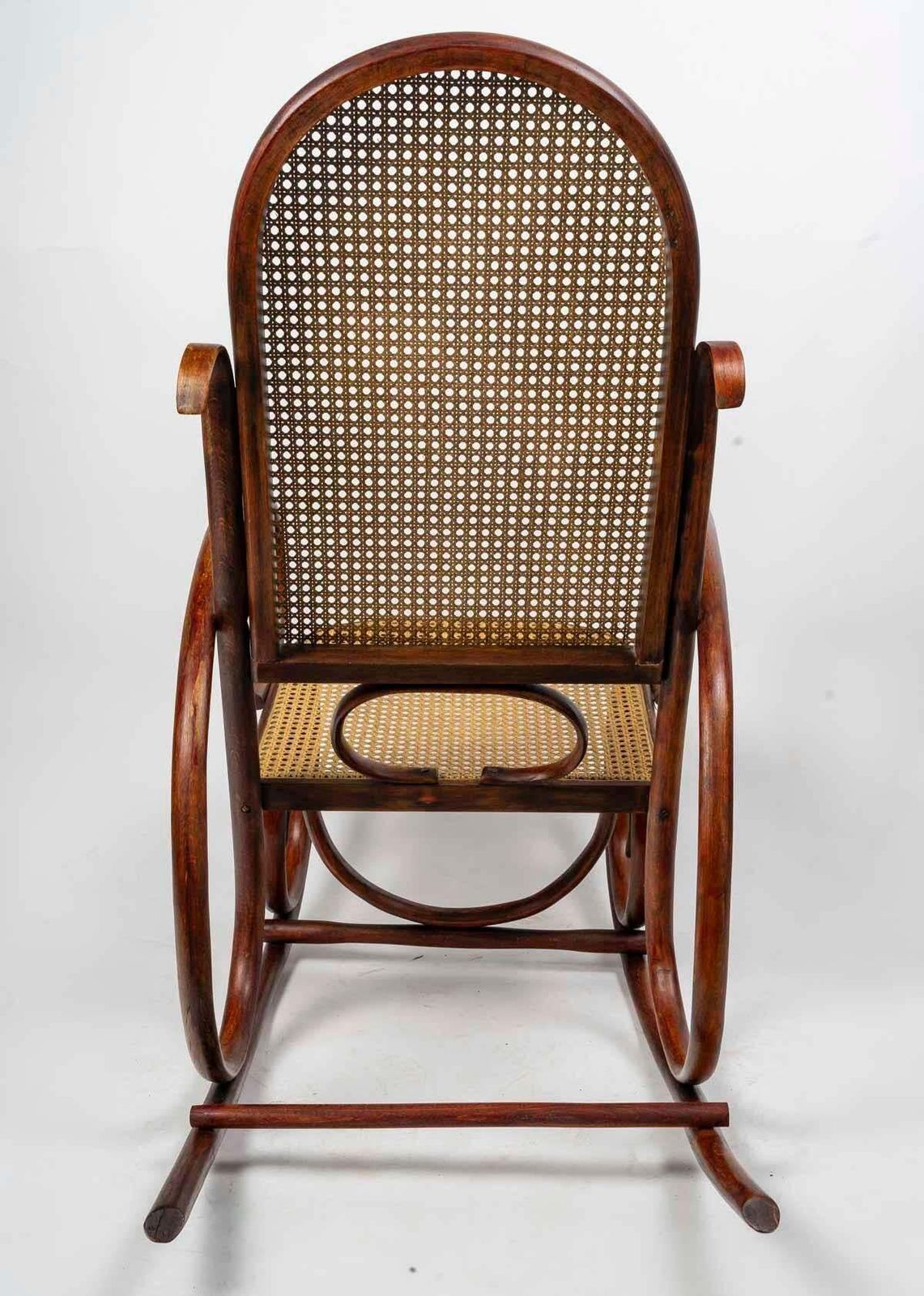 Rocking Chair In Turned Wood, Canework, Early 20th Century. photo for sale
