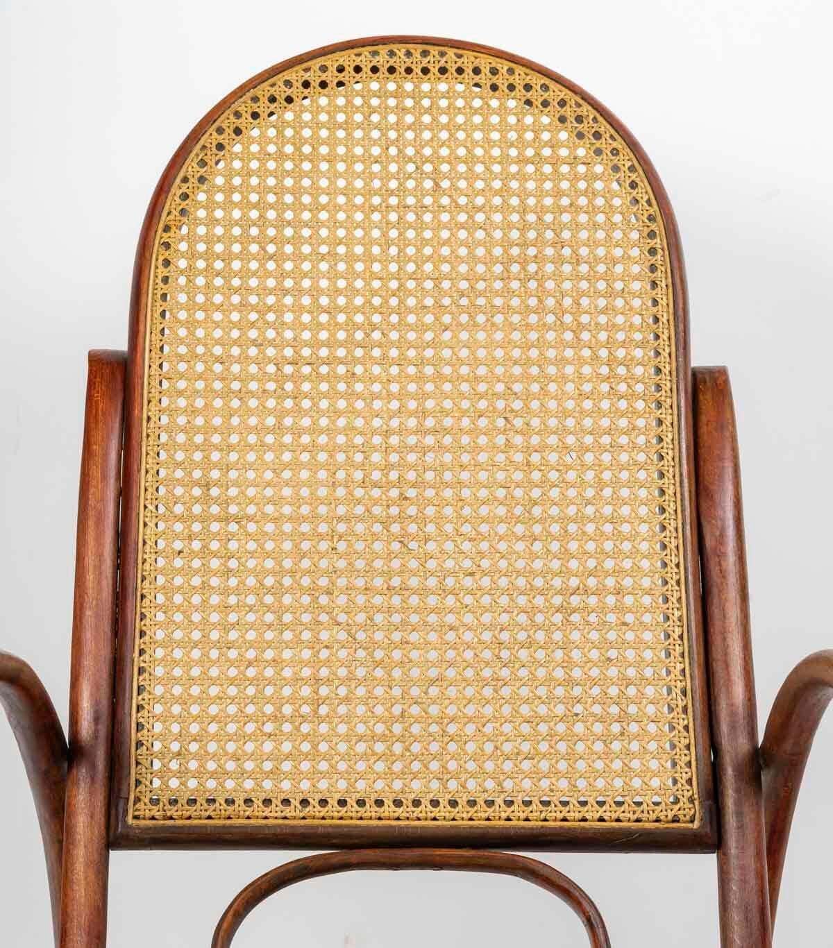 photo furniture Rocking Chair In Turned Wood, Canework, Early 20th Century.