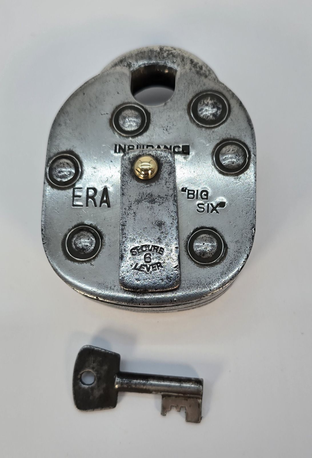 An Industrial Era 1930s Insurance Six Leaver Steel Padlock photo furniture