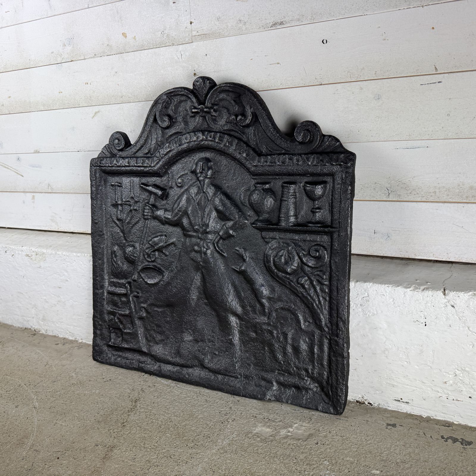 Antique Cast Iron Fire Back Depicting A Blacksmith photo for sale