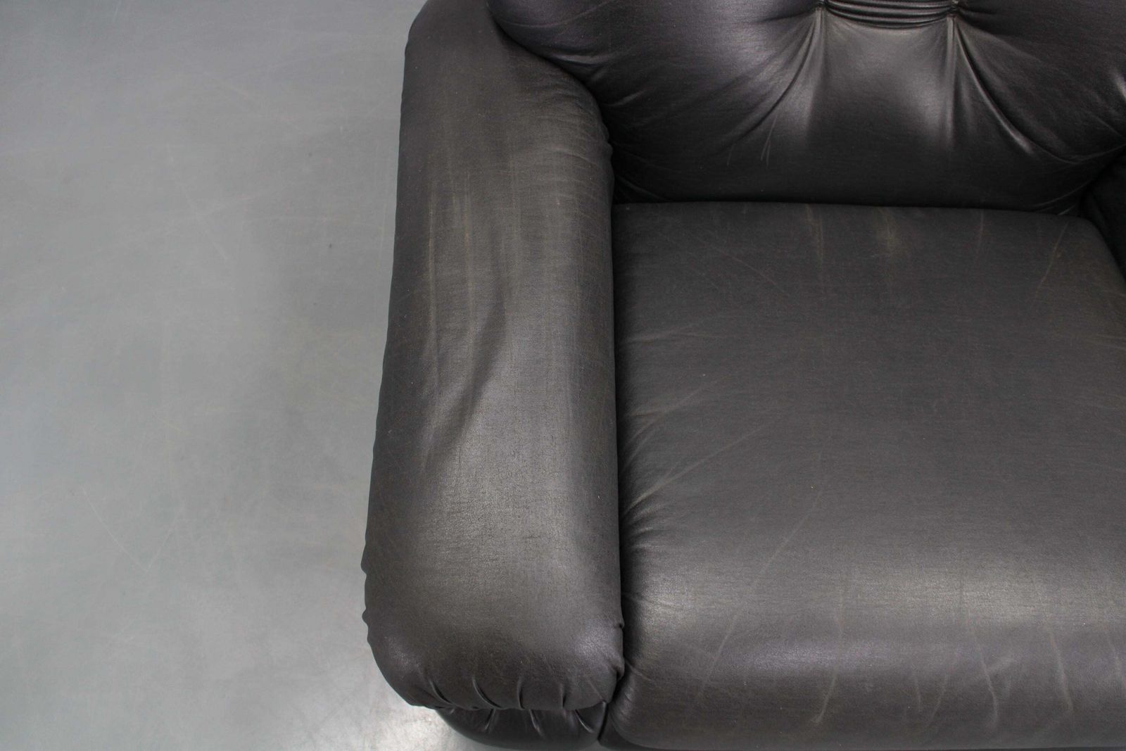 1216.0 1970s Italian Pompon Armchair In Black Leatherette By Ceriotti photo