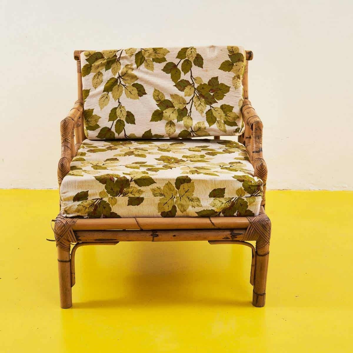 Vintage Rattan Armchair With Floral Cushions photo furniture