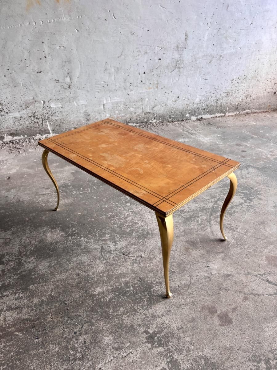 Furniture Vintage Golden Legs And Black Lines Top Coffee Table photo