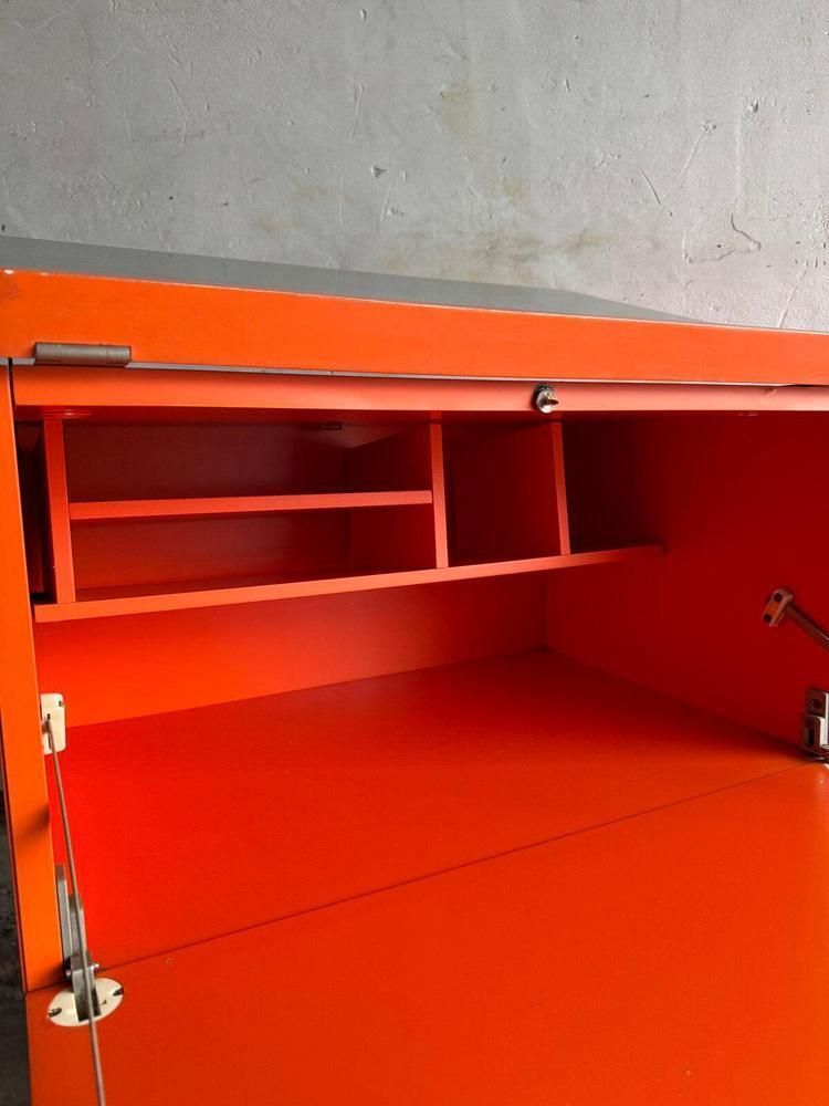 Orange Chest Of Drawers With Fold Out Work Surface And Slanted Top photo buy