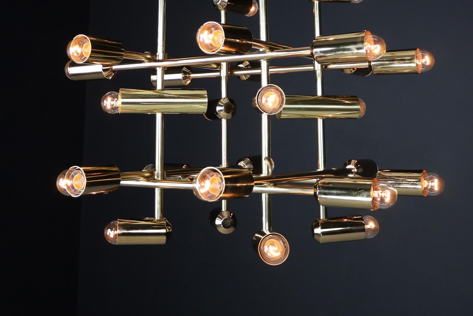 photo for sale Xl Mid Century Brass Chandelier With 40 Lights, Switzerland 1960s.