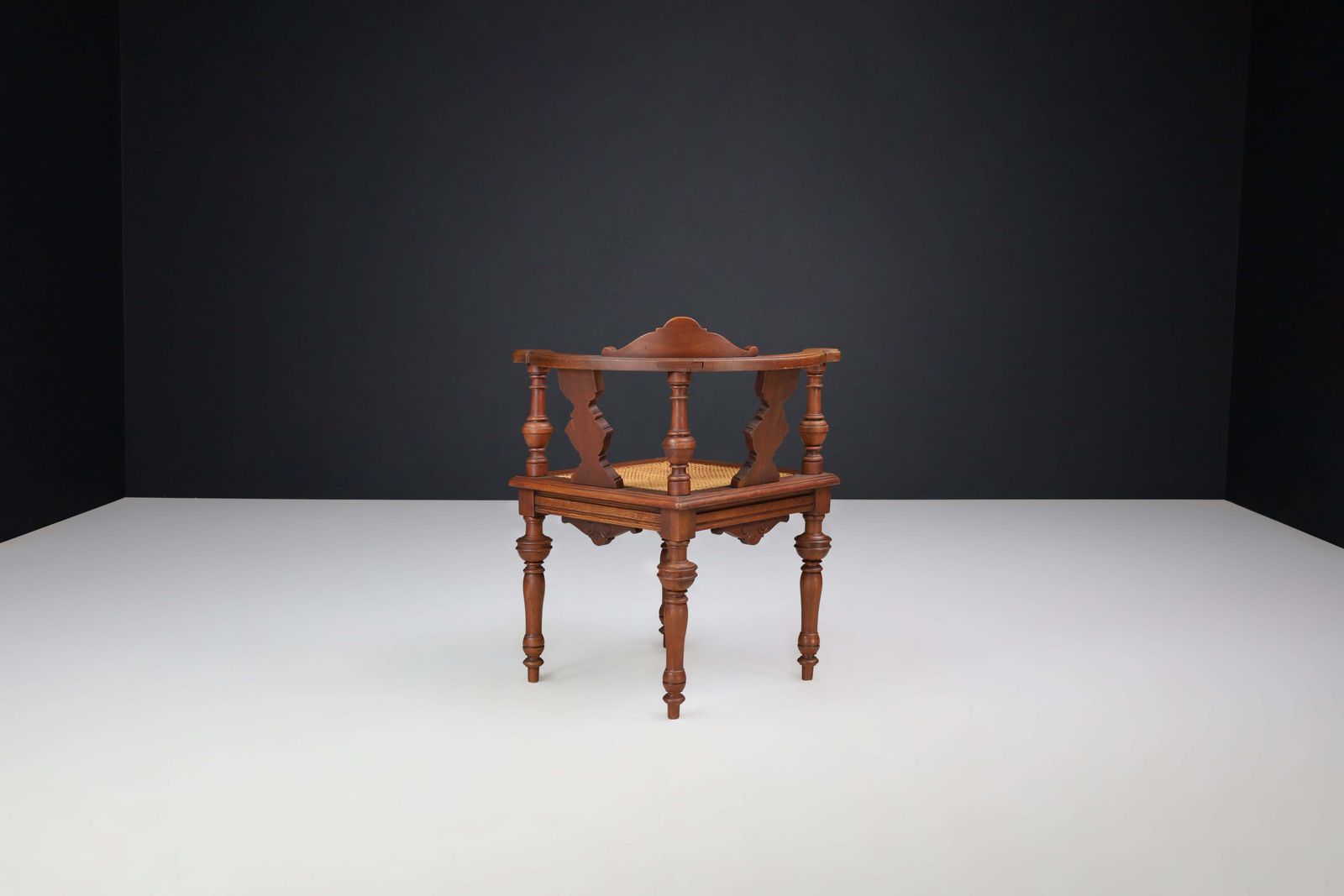 Antique German Corner Chair, Circa 1880 – Hand Carved Walnut With Cane Seat photo for sale