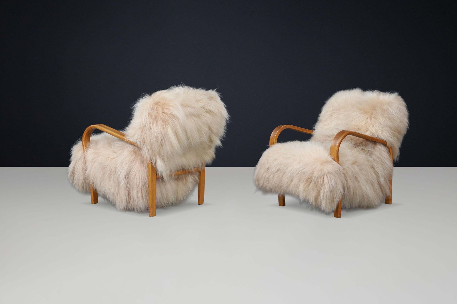 photo furniture Patinated Bentwood Lounge Chairs By Kozelka & Kropáček In Long Haired Icelandic.