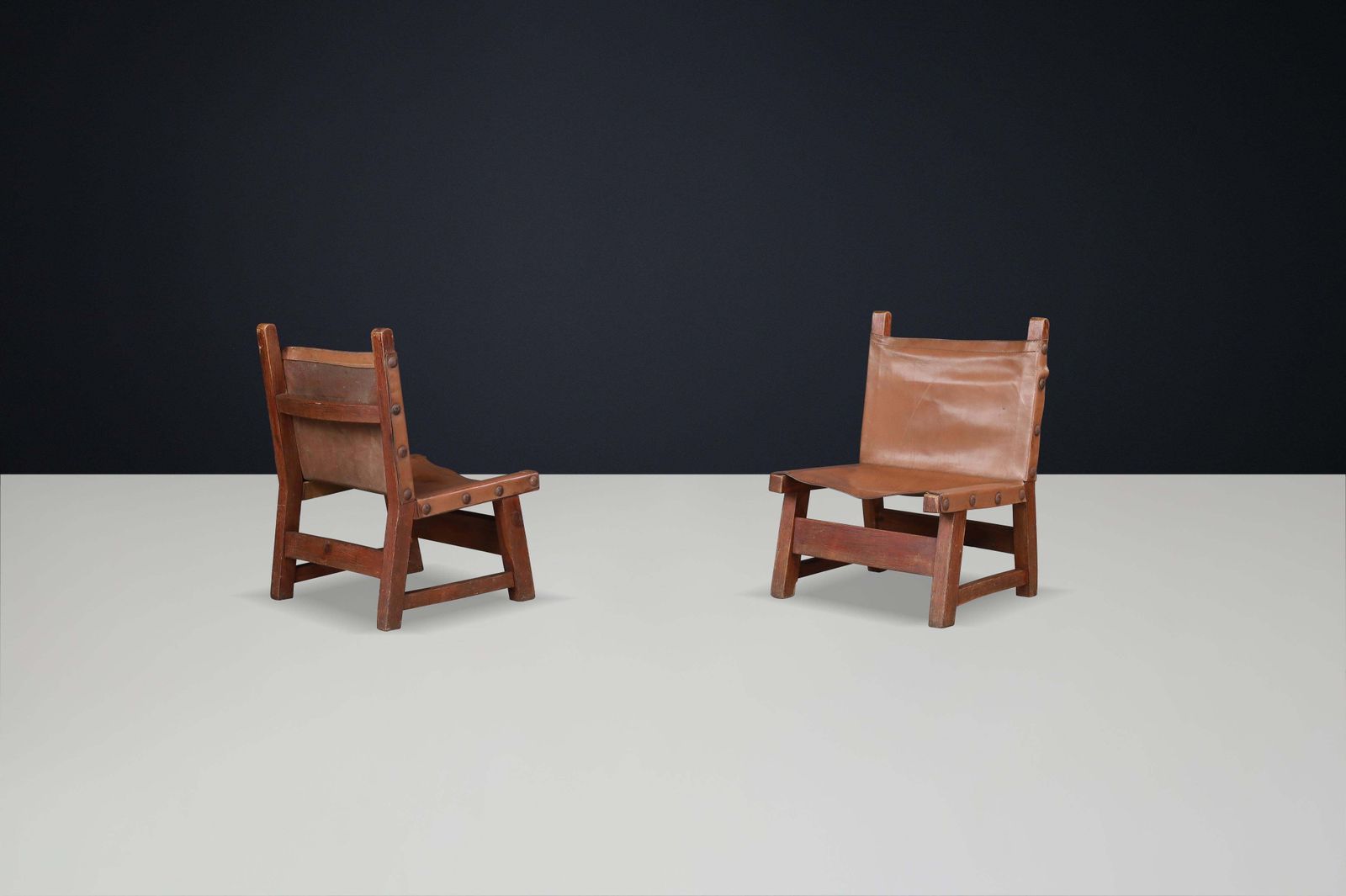 Brutalist Patinated Leather And Wood Easy Chairs, Spain, 1950s photo vintage