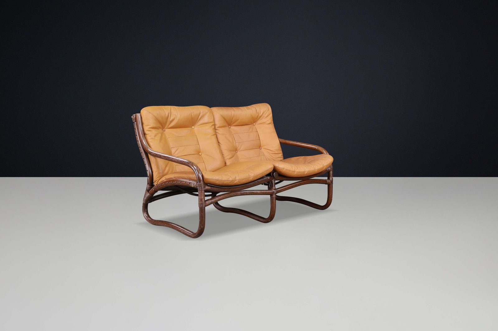 Two Seat “Ecco” Loveseat By Slettvoll In Cognac Leather And Rattan, Norway 1970s photo for sale