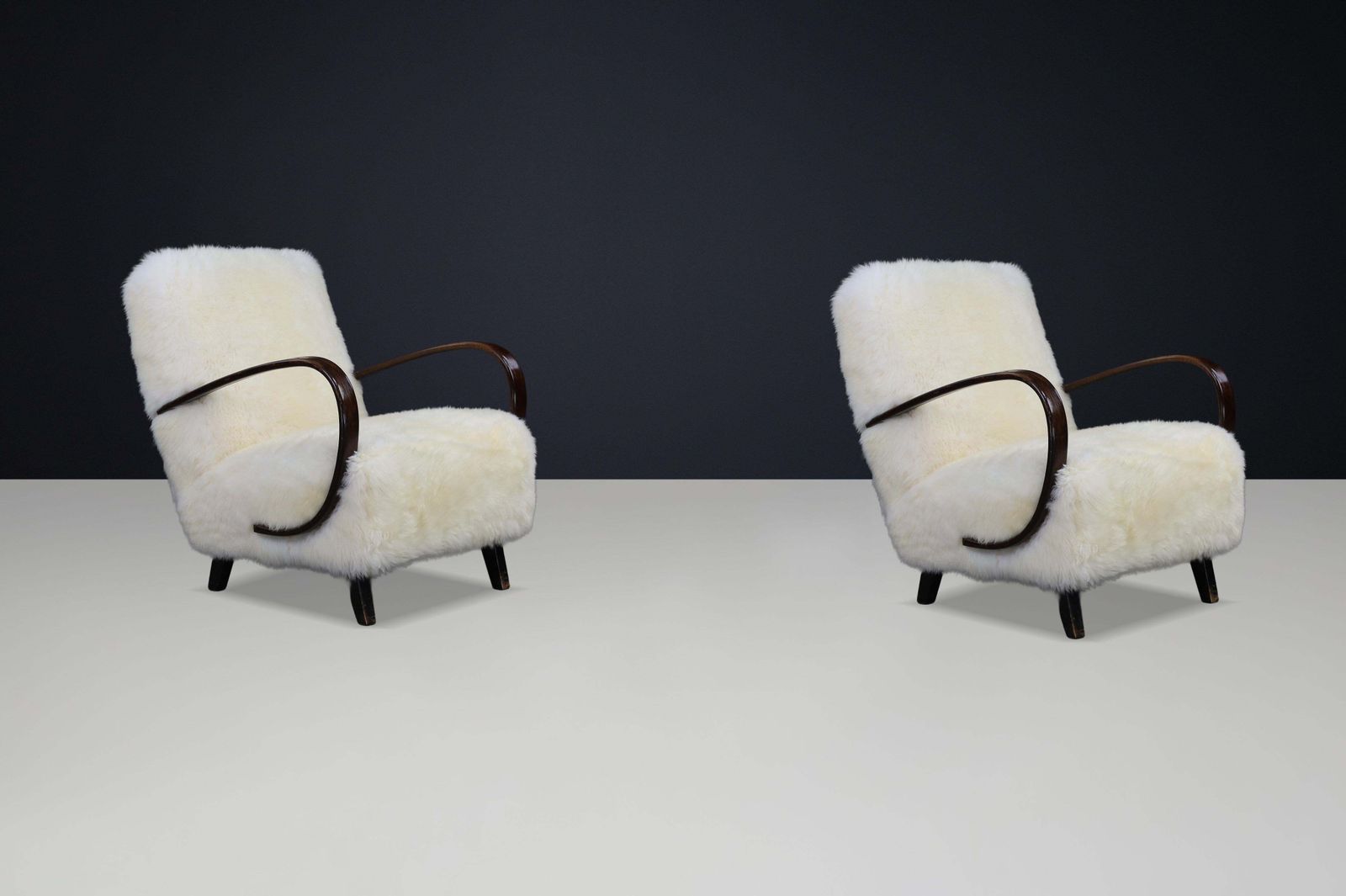 Timeless Pair Of Jindřich Halabala Mid Century Modern Sheepskin Lounge Chairs photo for sale