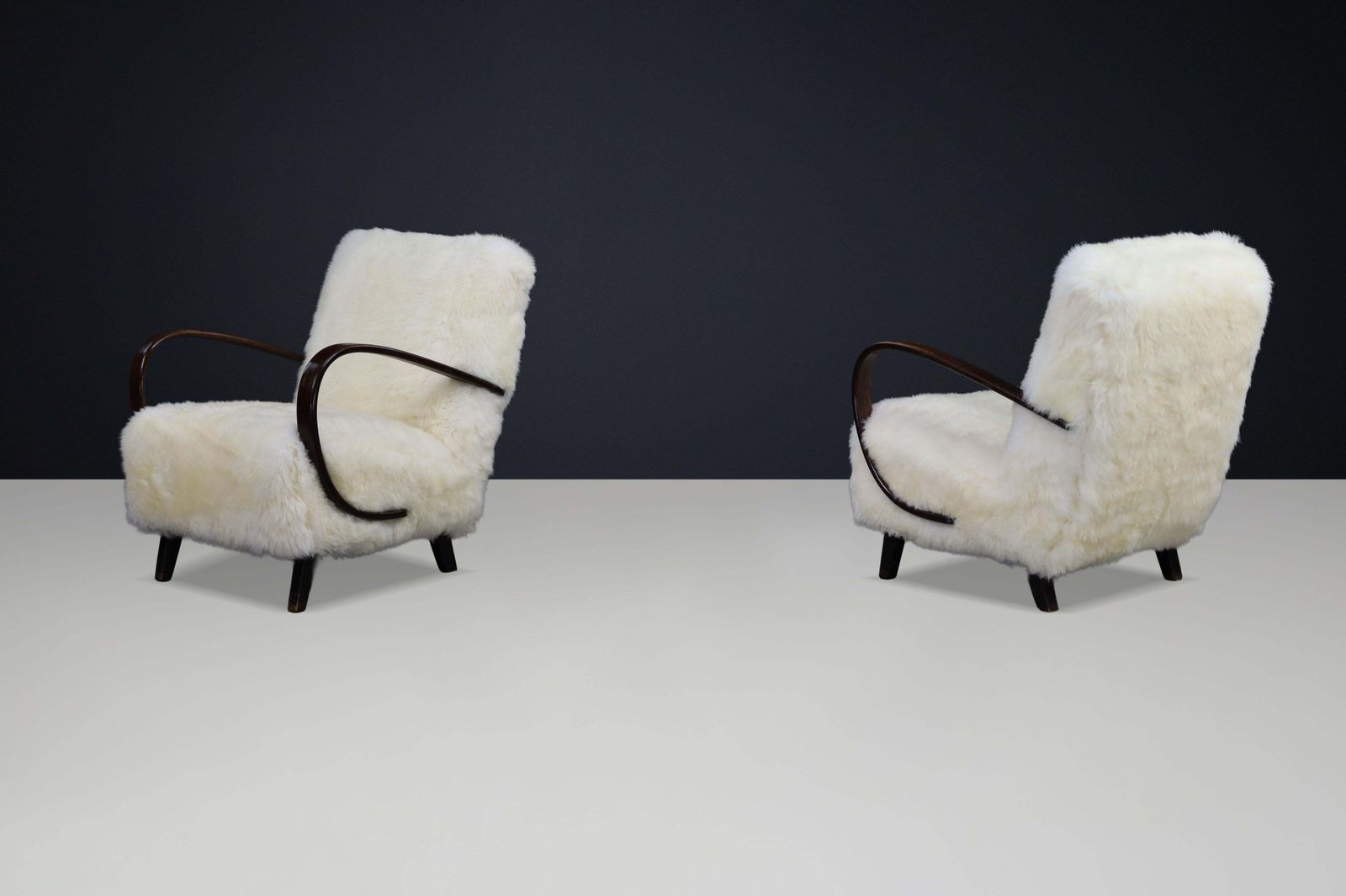 photo for sale Timeless Pair Of Jindřich Halabala Mid Century Modern Sheepskin Lounge Chairs