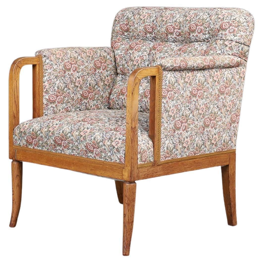 Elegant 1930s French Art Deco Oak Armchair With Original Floral Upholstery.