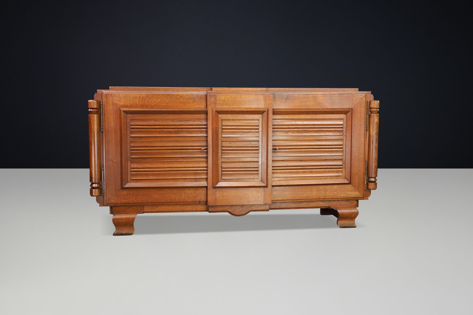 Furniture French Art Deco Patinated Oak Sideboard With Relief Carved Doors, 1940s photo