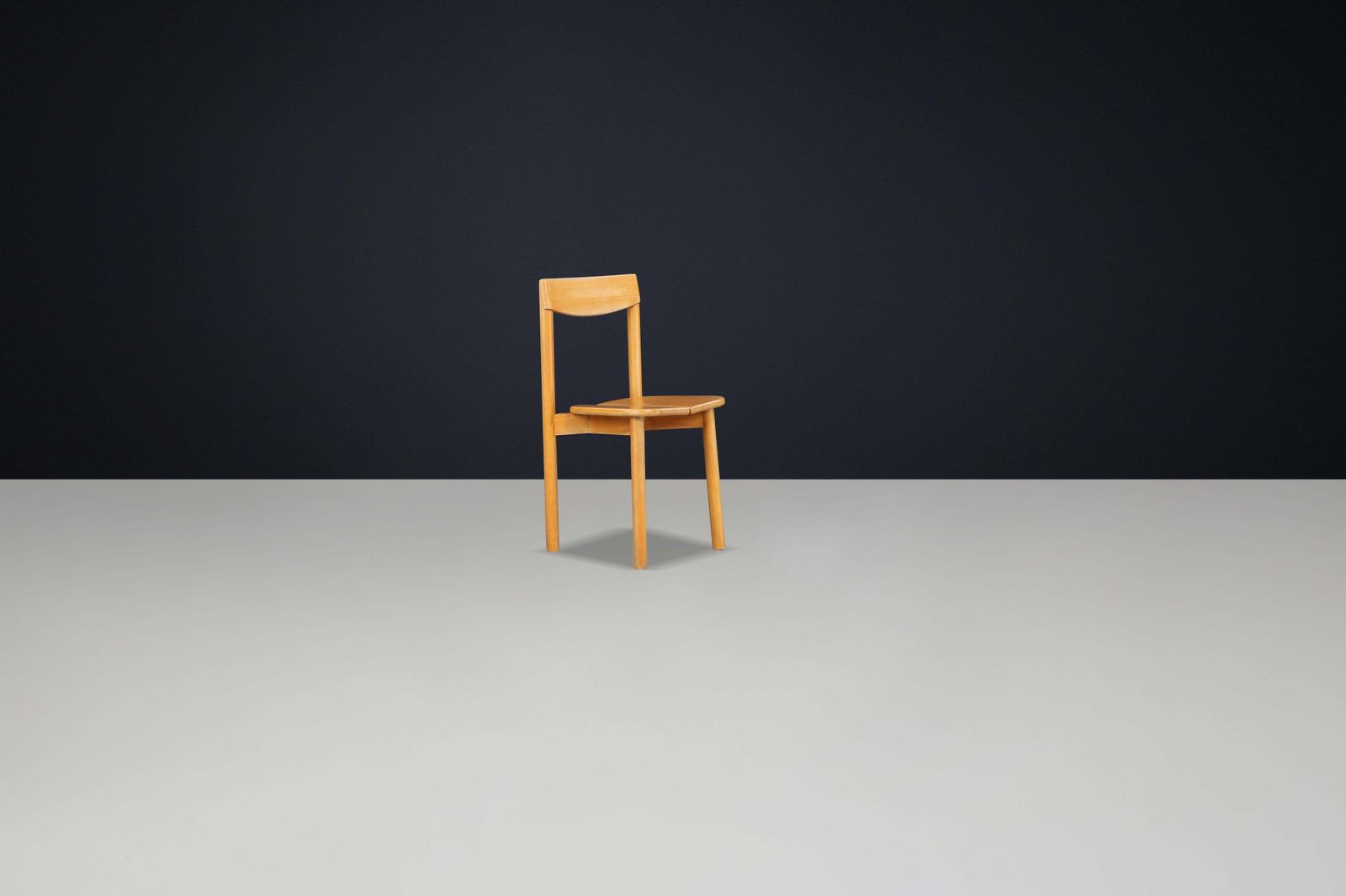 photo furniture Pierre Gautier Delaye “Coffee Bean” Dining Chairs In Stained Beechwood, France