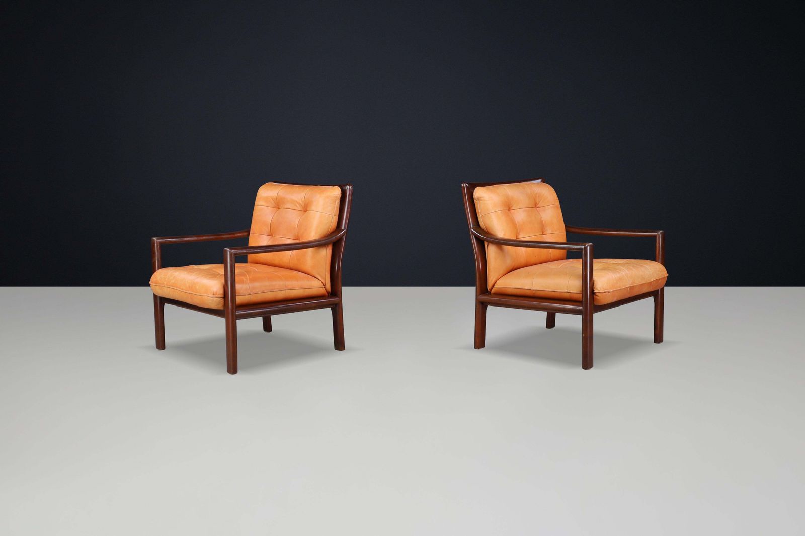 Pair Of Mid Century Lounge Chairs In Cognac Leather & Mahogany Stained Hardwood photo Furniture