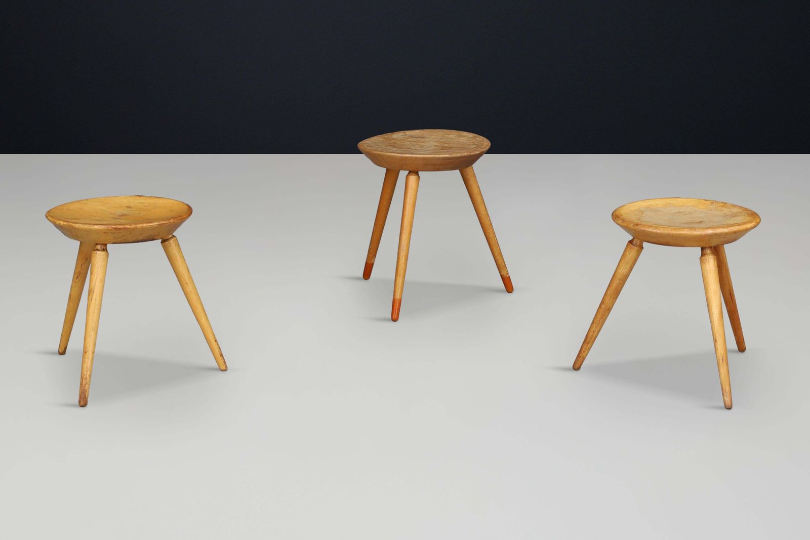 photo for sale Set Of Three Rustic Mid Century Tripod Stools In Solid Wood, France, 1950s