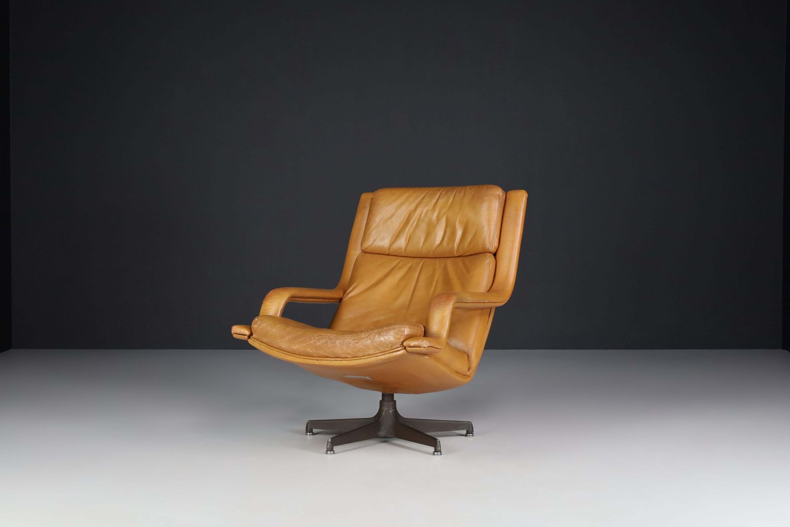 Geoffrey Harcourt Patinated Cognac Leather Swivel Lounge Chair, The Netherlands photo Furniture