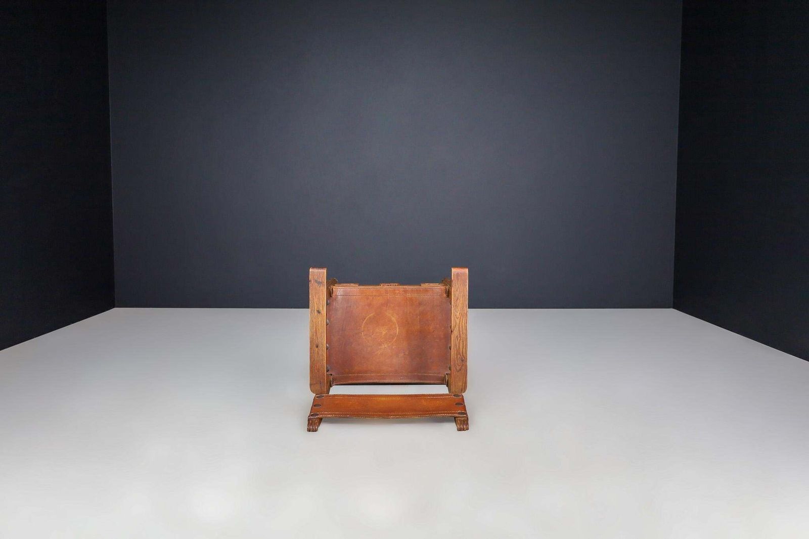 photo for sale Provincial Mid Century Armchairs In Patinated Cognac Saddle Leather, France 1950