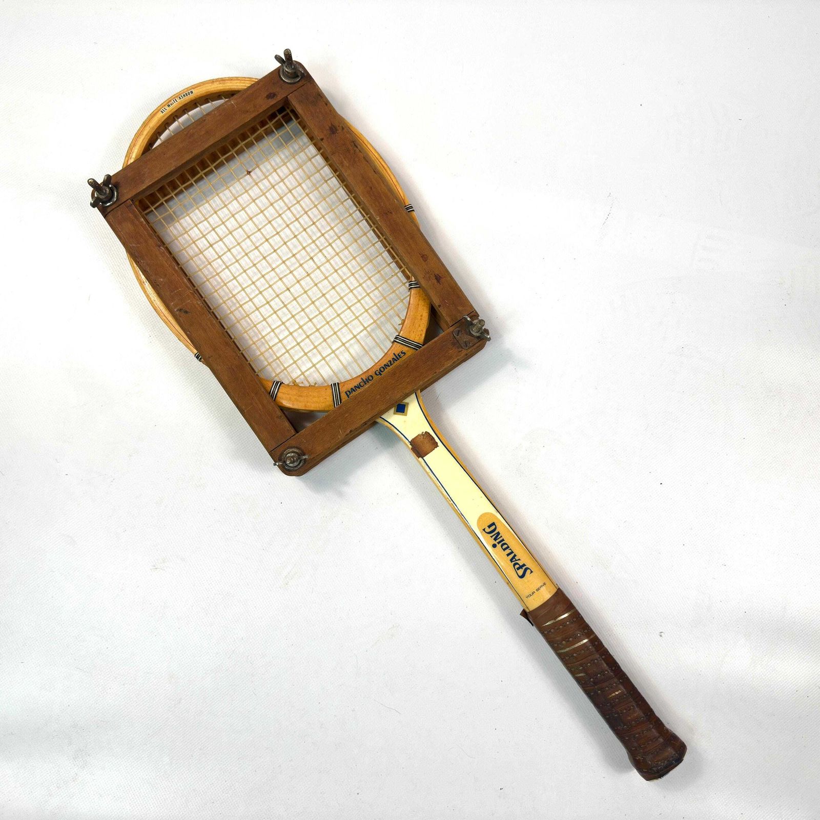 1960s Spalding Pancho Gonzales Tennis Racket With Press photo 95.0