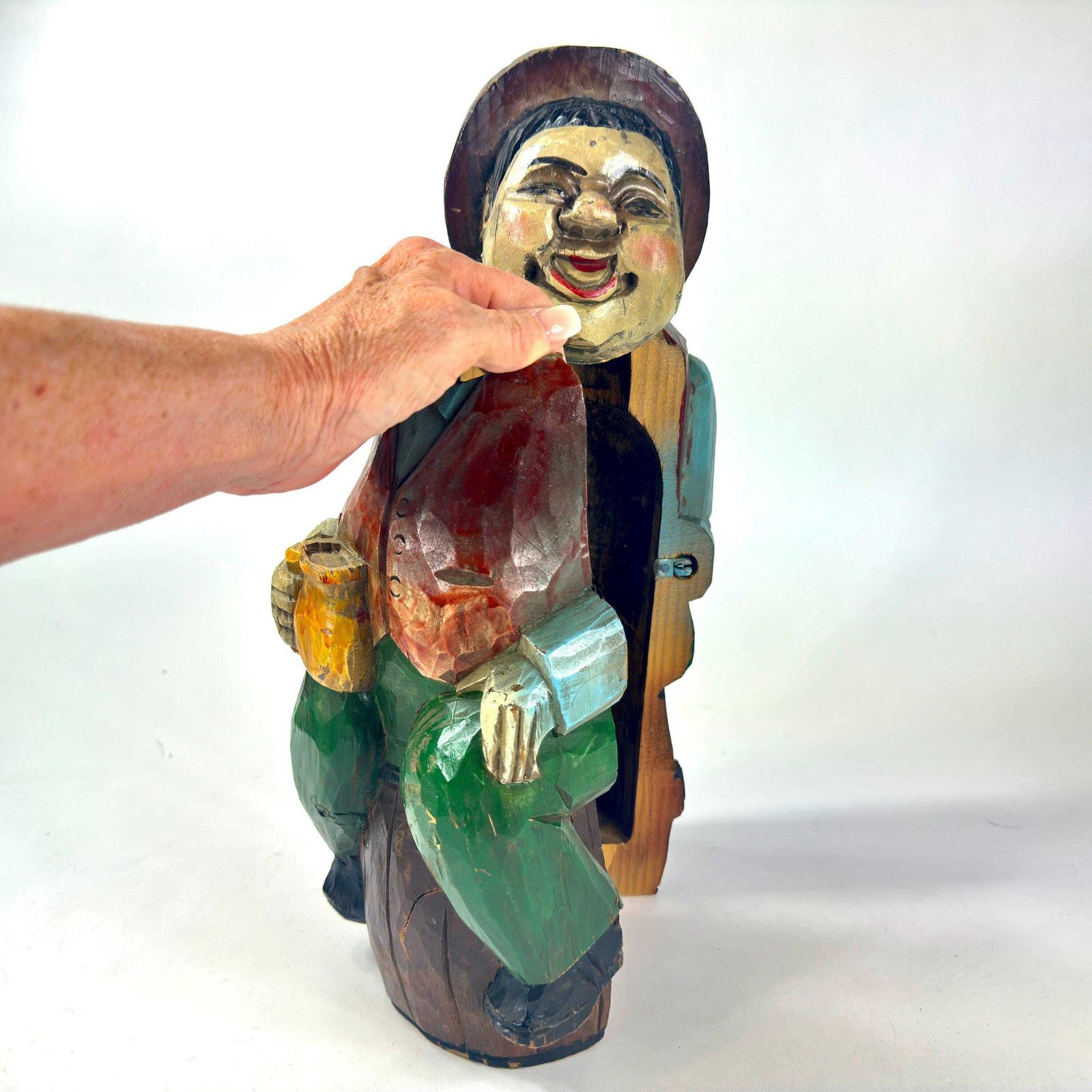 photo for sale Vintage Hand Carved Wooden Wine Container – Jolly Man Figure Holding A Stein