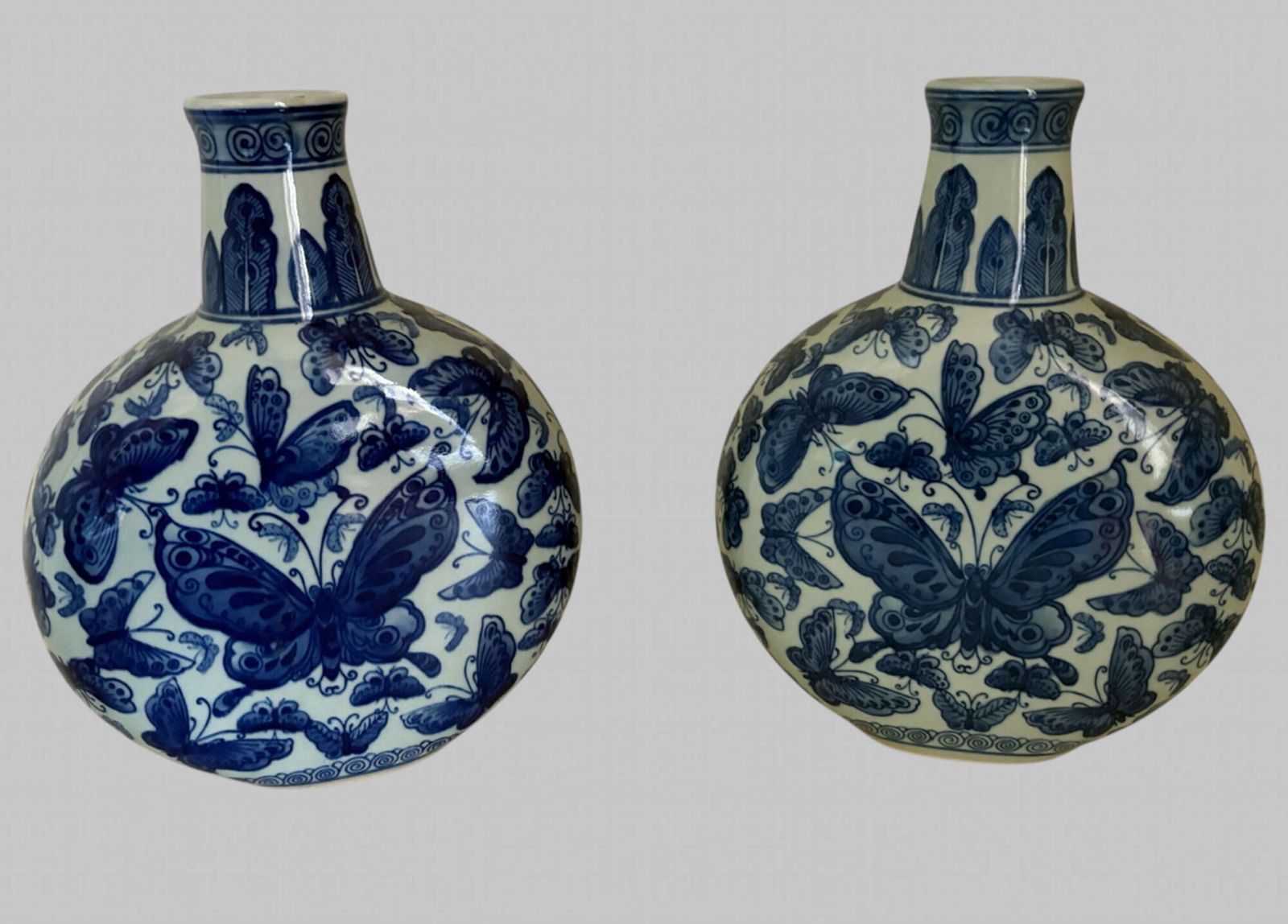 A Pair Of Matched Moon Flask Inspired Vases