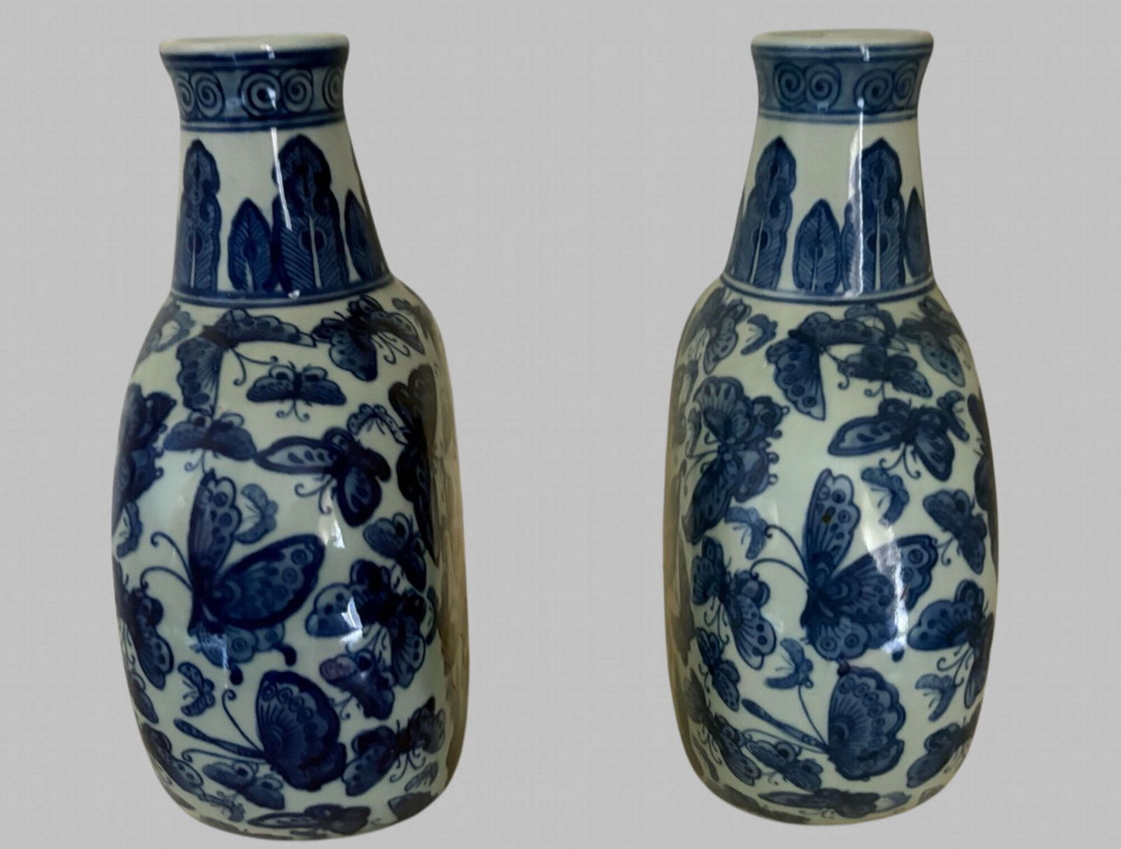 A Pair Of Matched Moon Flask Inspired Vases photo for sale