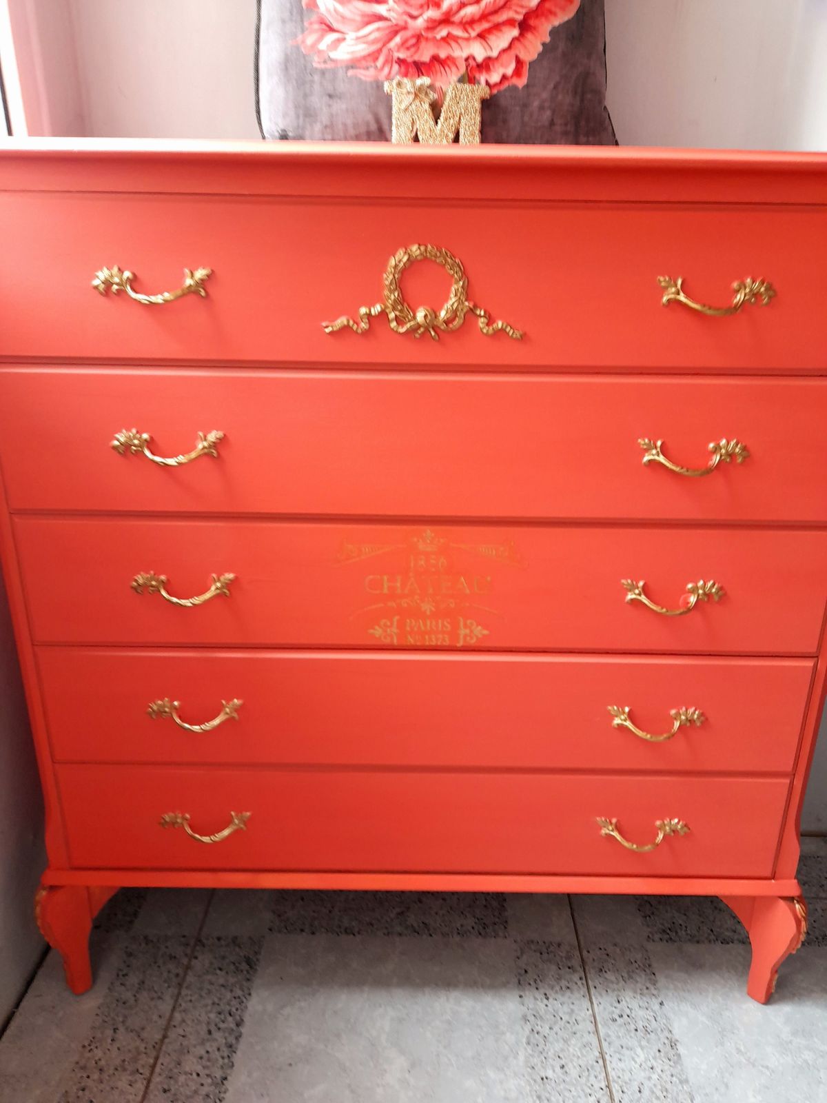 Olympus Five Drawer Chest. Hand Finished In Flamingo With Gold Highlights And Chateau Crest