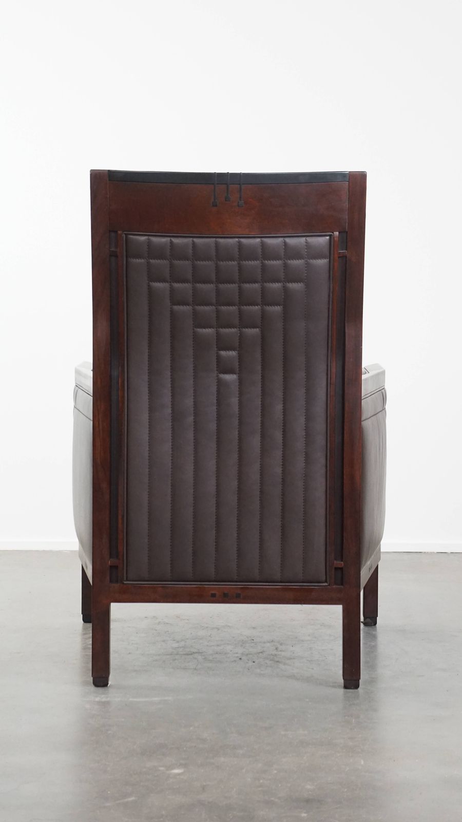 Luxurious Art Deco Design Armchair With Dark Brown Leather With Decorative Stitching photo Furniture