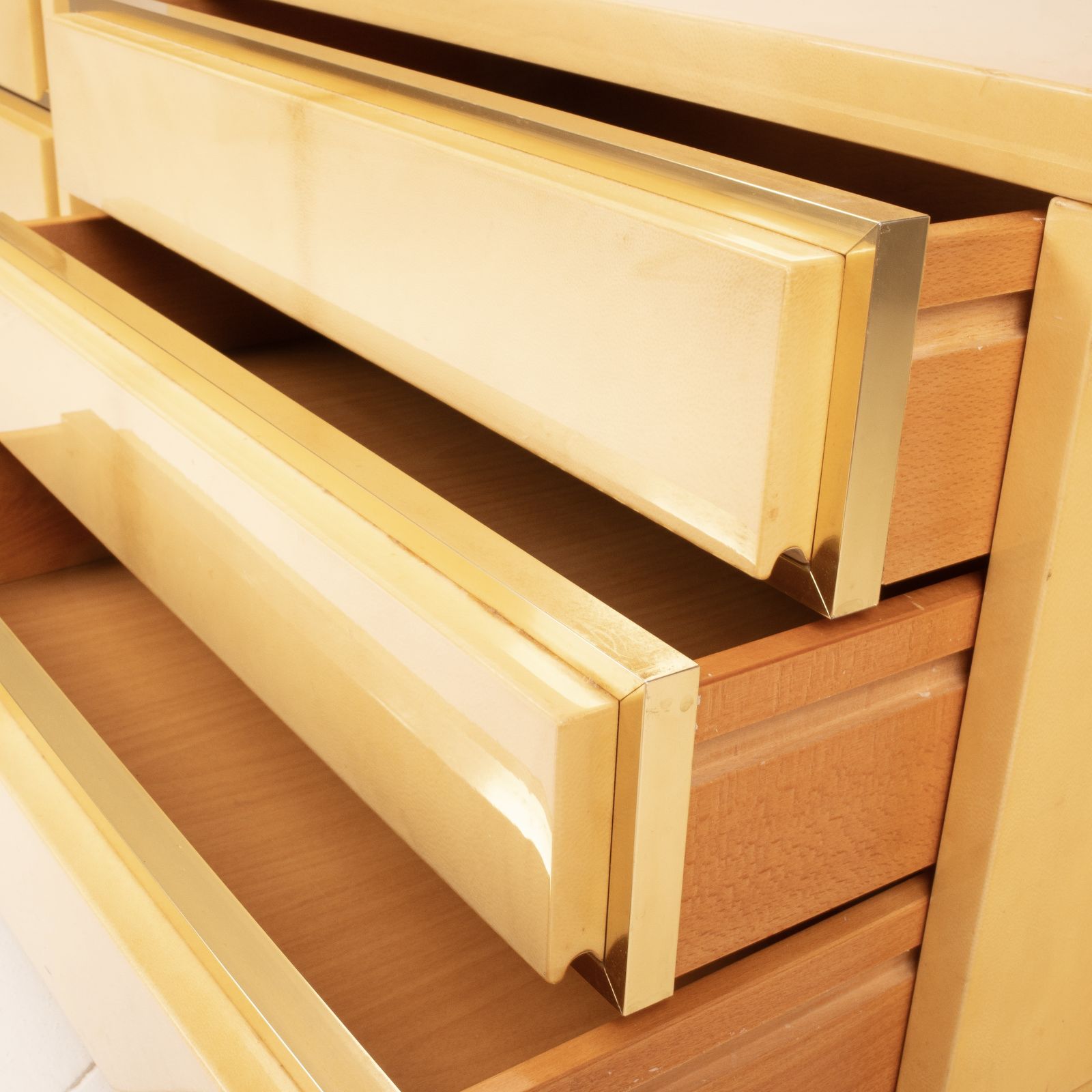 photo buy Pair Of Parchment Bedside Tables By Aldo Tura For Tura Milano