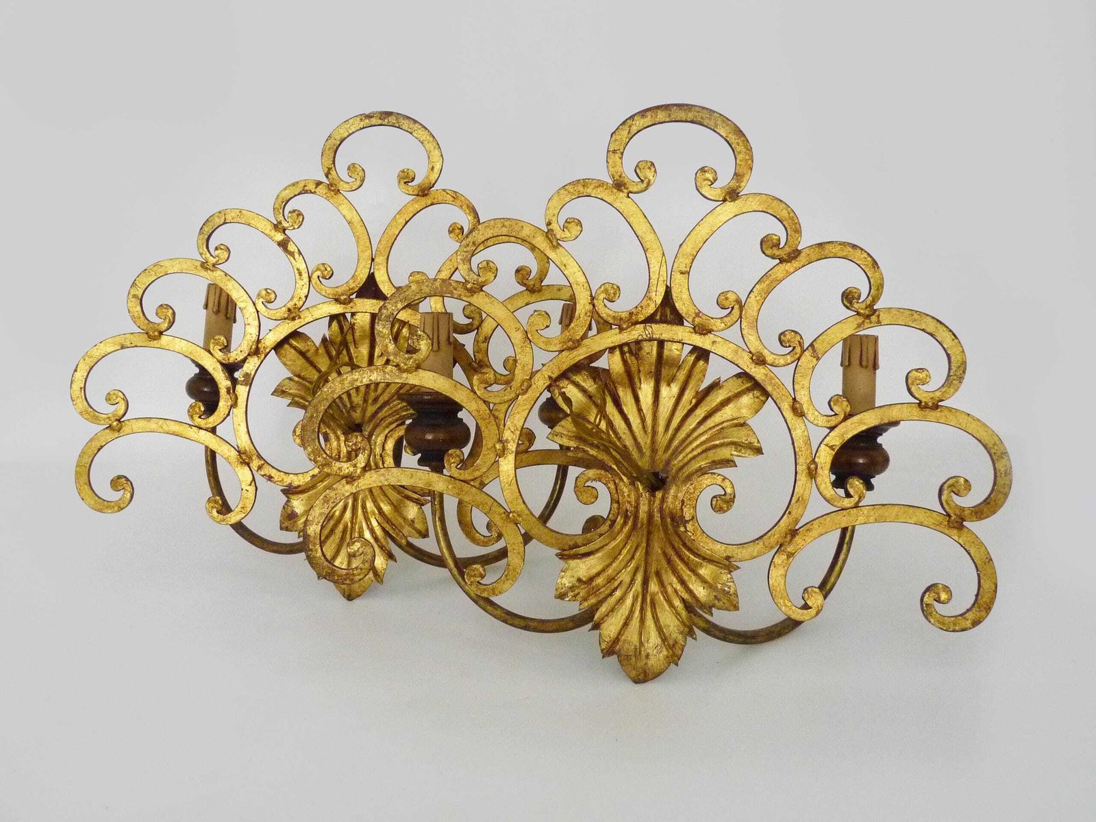 photo furniture Large Pair Of Italian Three Light Wall Sconces In Gilt Wrought Iron. 1950s