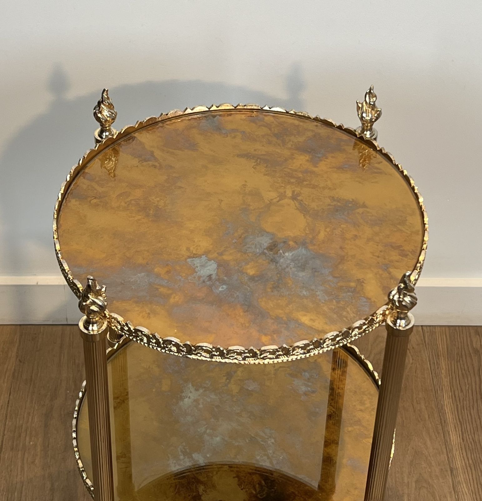 photo buy Round Silver Plated Brass Side Table With Triple Eglomisé Mirrored Shelves By Maison Jansen