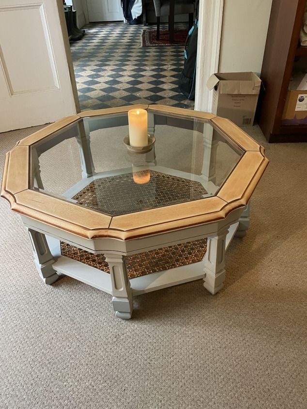 A Lovely Mahogany Octagonal Coffee Table On Pillar Legs And A Glass Top. photo for sale