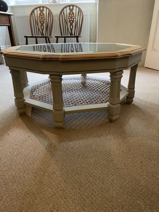A Lovely Mahogany Octagonal Coffee Table On Pillar Legs And A Glass Top. photo Furniture