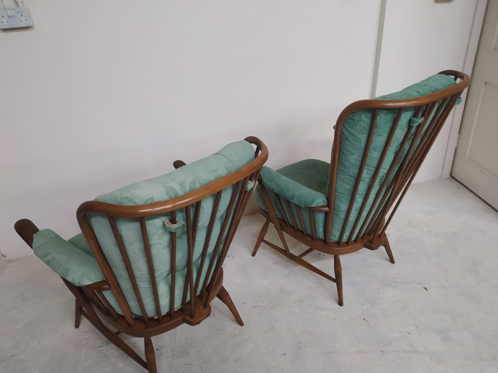 photo vintage Ercol Evergreeen Pair Of Vintage Armchairs.