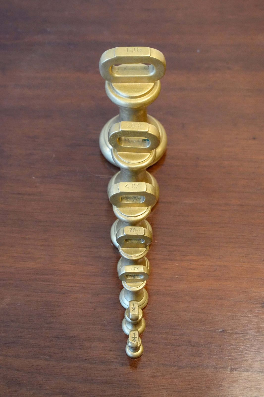 Set Of Brass Weights (Imperial). photo furniture