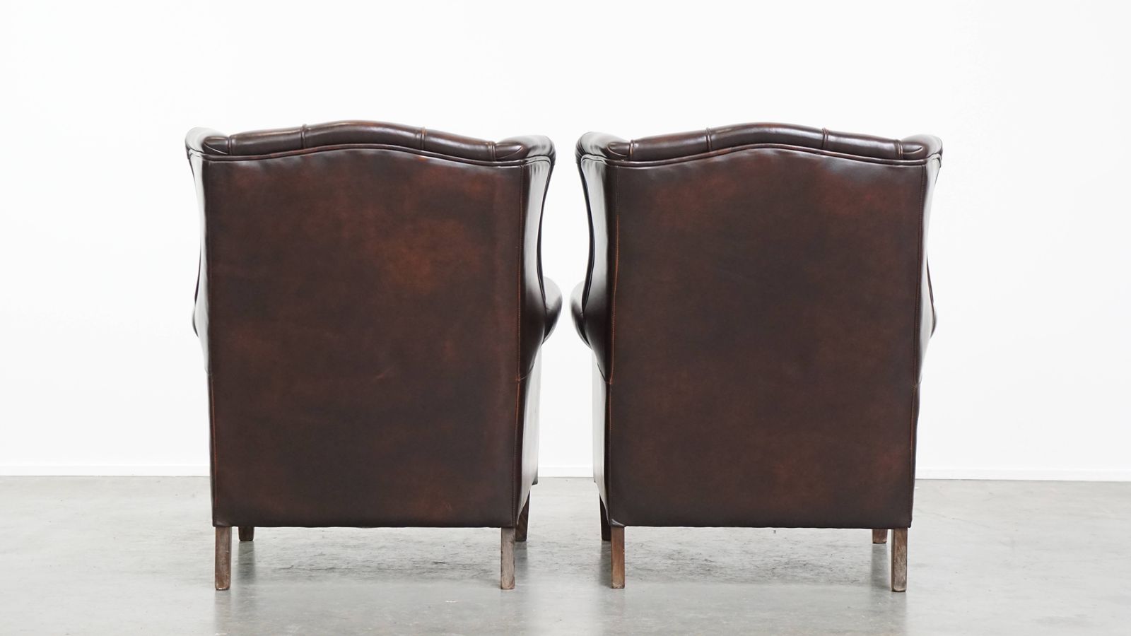 Comfortable And Very Beautiful Set Of 2 English Style Cowhide Wing Chairs With A Luxurious Finish photo for sale