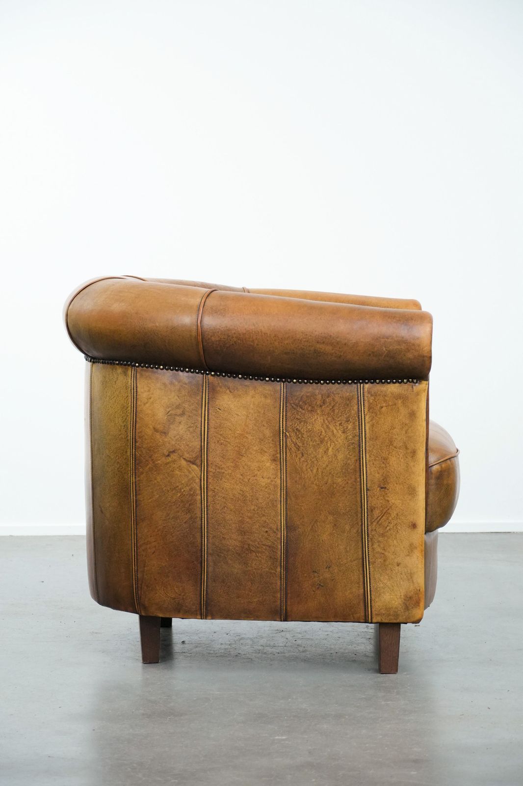 Elegant Sheepskin Club Armchair With Beautiful Warm Colours, A Finish With Decorative Nails And Beautiful Stitching photo for sale