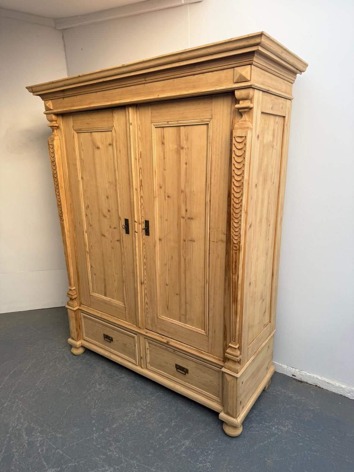 A Carved Arts & Crafts Pine Knockdown Wardrobe To Wax/Paint