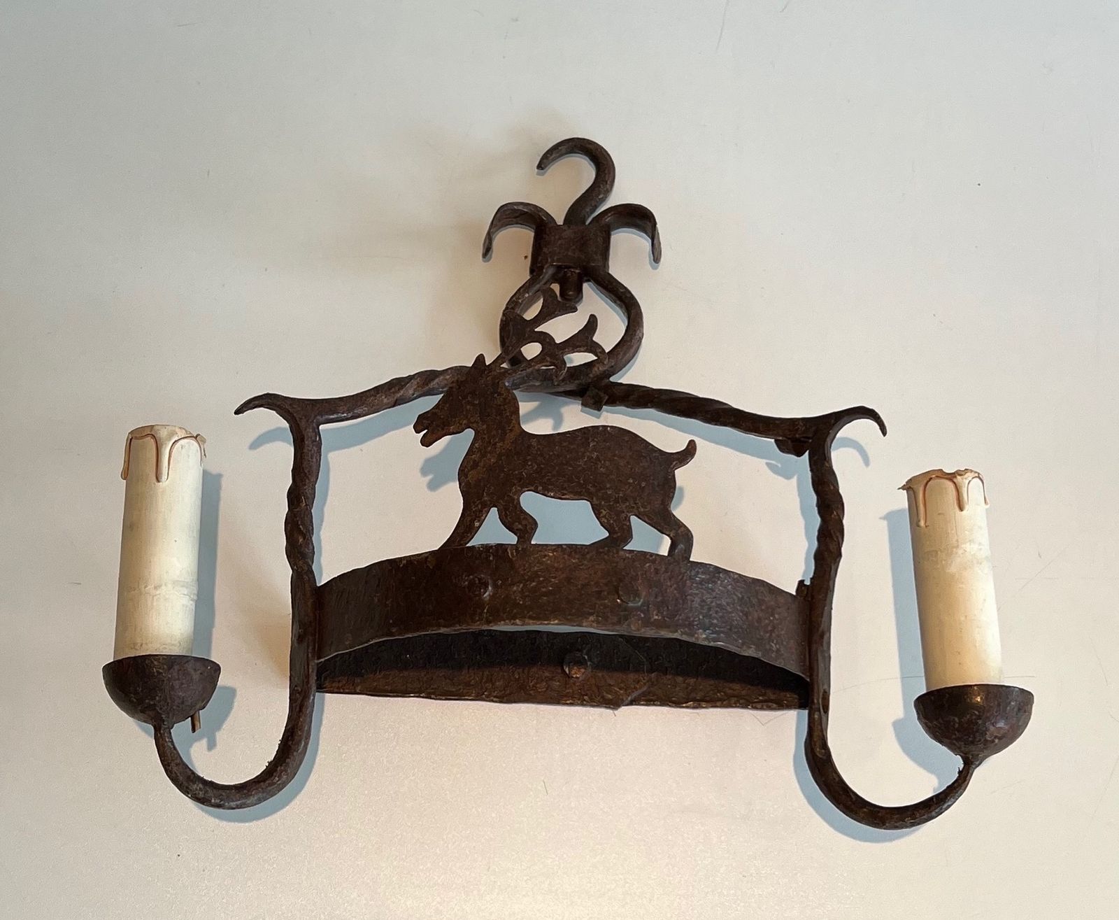 Pair Of Wrought Iron Wall Sconces Depicting Animals photo 1250.0